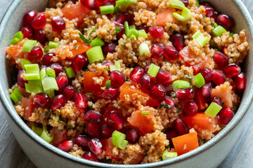 Kisir - spicy Turkish bulgur wheat salad in bowl. Authentic Turkish meze.