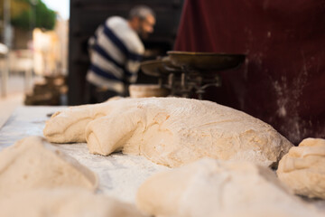 Yeast dough on baking table. cooking process