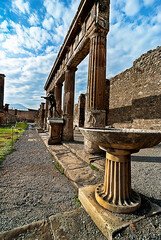 The old ruins of Apollon Temple in Pompeii - 702884517