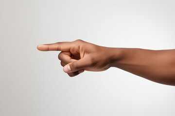 A black male's hand pointing to the right against a light background