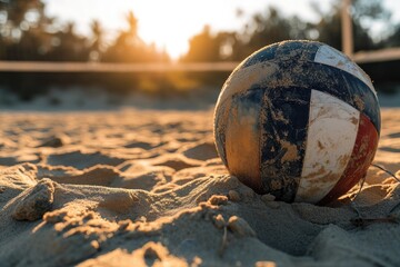 Detailed view of a volleyball on a sandy beach court, focusing on the ball's texture and sand grains