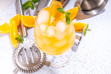 Orange and mint alcohol cocktail