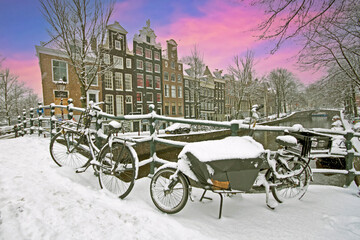Fototapeta na wymiar Amsterdam in winter in the Netherlands at sunset