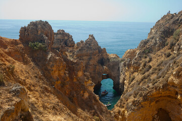 Ponta da Piedade cliffs & arches. Travel destination in Europe.