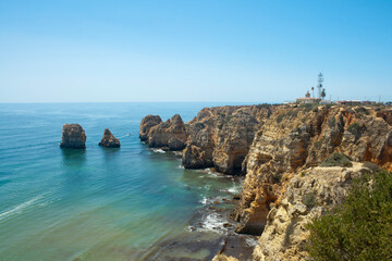 Ponta da Piedade cliffs. Travel destination in Europe.