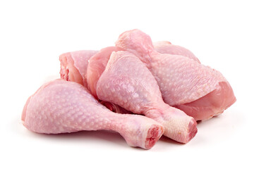Raw chicken drumsticks, isolated on white background.