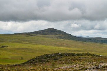 Mountains in the state of Minas Gerais in Brazil. This region is inland and is called Lapinha da Serra and is part of the mountain range called Espinhaco. This mountain range is made up of high peaks,