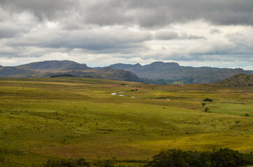 Fototapeta na wymiar Mountains in the state of Minas Gerais in Brazil. This region is inland and is called Lapinha da Serra and is part of the mountain range called Espinhaco. This mountain range is made up of high peaks,