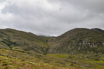 Mountains in the state of Minas Gerais in Brazil. This region is inland and is called Lapinha da Serra and is part of the mountain range called Espinhaco. This mountain range is made up of high peaks,