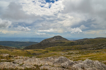 Mountains in the state of Minas Gerais in Brazil. This region is inland and is called Lapinha da Serra and is part of the mountain range called Espinhaco. This mountain range is made up of high peaks,