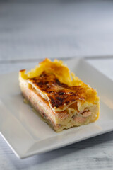 lasagne with salmon, bechamel and parmesan cheese