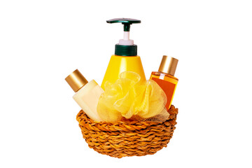A straw basket with cosmetics and soap dispender isolated on a white background. Gift or present basket. Bath products and skincare. Spa treatment. Hotel accessories.