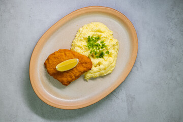 Typical Czech cuisine chicken cutlet with mashed potatoes