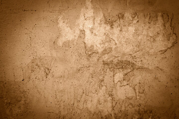 Old traditional house wall texture, brown beige color plaster background.