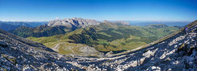 Awesome panoramic mountain scenery in the dolomites: View from Sassopiatto peak to Rosengarten...