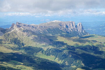 Amazing dolomite panoramic view of Alpe di Siusi, Puez Odles Naturepark upto Sassolungo mountain range in South Tyrol, Italy. 