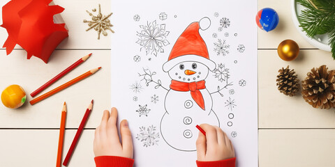 Child's snowman drawing with winter decorations