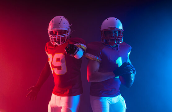 Two American football players in neon lights. Template for bookmaker ads with copy space. Mockup for betting advertisement. © Mike Orlov