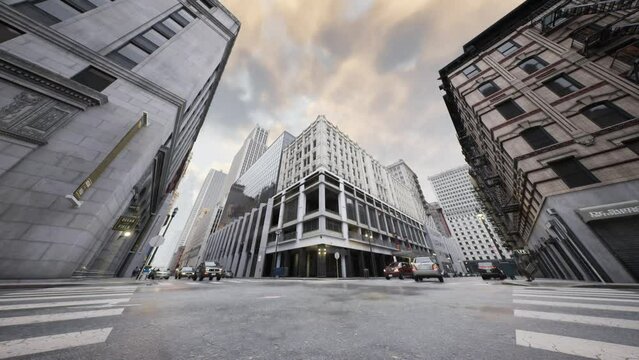 The camera captures from a low point the intersection of two streets in a large city.