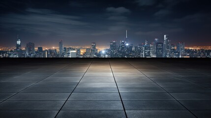 Empty view of empty concrete tile floor with big city skyline. Night scene.