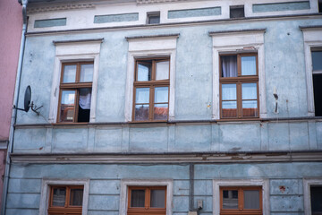 Exploring the Facade of an Old European Building, Bursting with Vibrant Colors