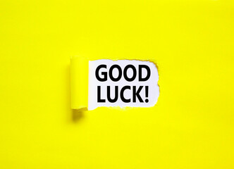 Good luck symbol. Concept words Good luck on beautiful white paper. Beautiful yellow paper background. Business, motivational good luck concept. Copy space.
