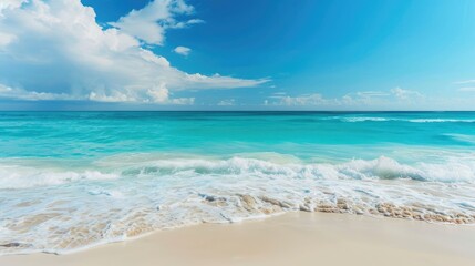 Fototapeta premium Beautiful sandy beach and soft blue ocean wave, Summer seascape background.