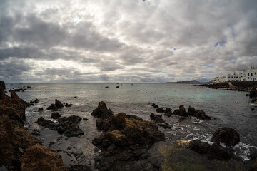 Rocky shore of Punta Mujeres bay. Lanzarote, Canary Islands. Spain.