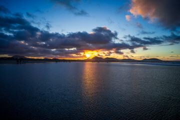 The evening's Famara Beach (Playa de Famara) -  popular surfing beach in Lanzarote. Canary Islands. Spain.