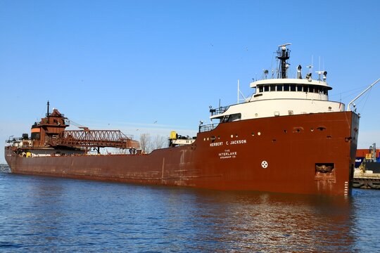 Great Lakes bulk carrier ship arrives with a load of iron ore taconite pellets from Minnesota to the local steel mill. Cleveland, Ohio, USA - January 4