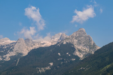 Panoramic view of mount Vrh Jerebceve police and Monte Forato seen from Bovec, Julian Alps, Slovenia Jagged contours of majestic mountain peaks in Soca valley. Wanderlust hiking in wild Slovenian Alps