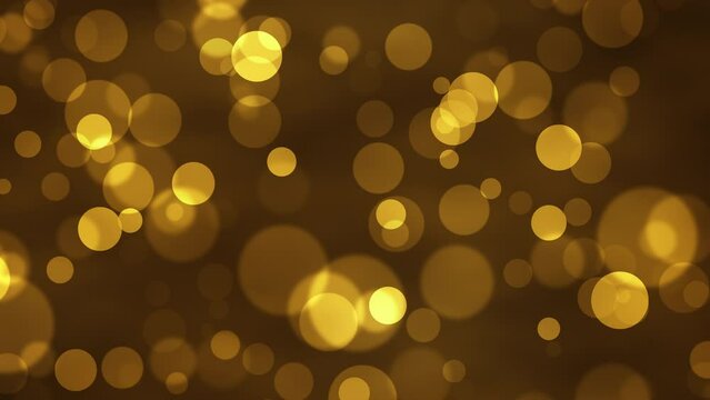 Golden glowing bokeh particles animation.Gold and  brown background.Moving bubbles colorful blurred animation backdrop.christmas and valentine's day background.	