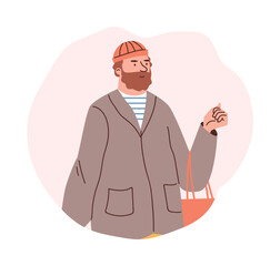 Portrait of bearded man in hat carrying shopping bag.