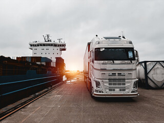 Cargo Truck Delivered The Engine Spare Parts For The Container Cargo Ship In The Port During Maintenance And Repairs