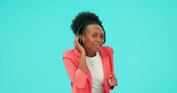 Music, dance and black woman with headphones for question in studio isolated on a blue background mockup space. Radio, listen and person ask, streaming podcast sound or audio for hearing in portrait