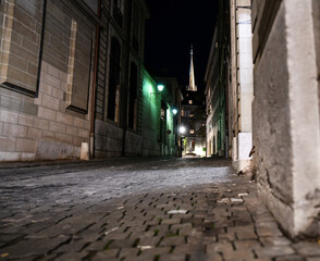 Empty lighted walkway road at night in the city