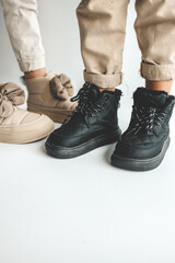 Stylish fashionable boots close-up for boys and girls