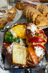 Bread with different fillings on the counter of the bakery.