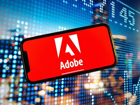 Konskie, Poland - January 04, 2024: Adobe Inc company logo displayed on mobile phone screen