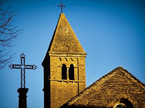 Parish church in Taize, France at sunset.