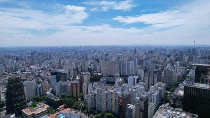 Fototapeta premium Aerial view of Avenida Paulista in Sao Paulo, Brazil. Very famous avenue in the city. High-rise commercial buildings and many residential buildings