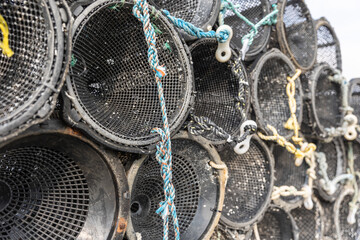 Stack of lobster pots piled high - Conwy Quay, North Wales