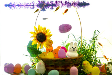 Easter basket underwater with gold fish watching the purple cloud