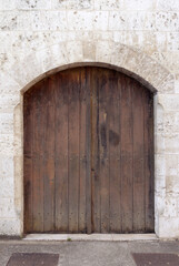 Fototapeta na wymiar Old brown wooden door closeup