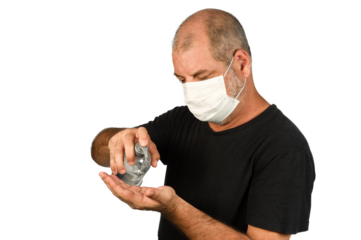 Portrait of a man, in a medical mask using alcohol gel. A concept of the danger of COVID-19 coronavirus for the elderly. on white background with space for text