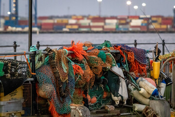 A pile of fishing nets hanging on Harwich pier 