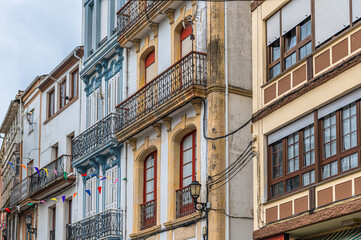 Fototapeta na wymiar Colorful street in the town of Navia, Spain