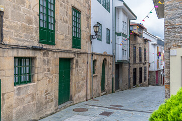 Fototapeta na wymiar Colorful street in the town of Navia, Spain