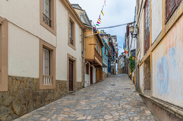 Colorful street in the town of Navia, Spain