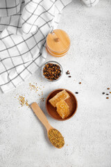 Composition with bee products on light background